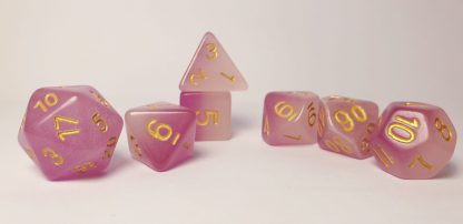 Glow in the dark pink and white polyhedral dungeons and dragons dice set