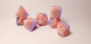 Pink and purple dungeons and dragons polyhedral dice set