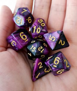Purple and black marble effect dungeons and dragons polyhedral dice set