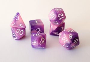 Pink and purple marble effect dungeons and dragons polyhedral dice set