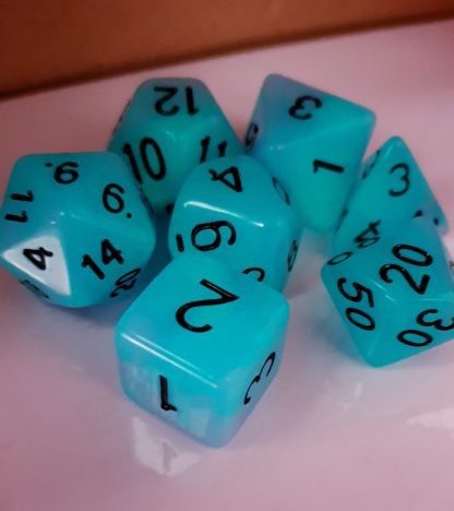 Glow in the dark purple and blue dungeons and dragons polyhedral dice set
