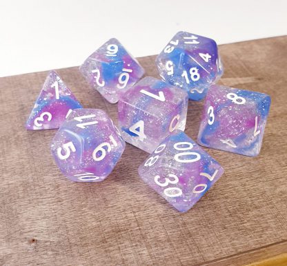 Purple, blue and glitter dungeons and dragons polyhedral dice set