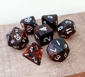 Red and glitter dungeons and dragons polyhedral dice set