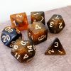Orange and black nebula galaxy effect dungeons and dragons polyhedral dice set