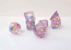 pink and blue iridescent dungeons and dragons polyhedral dice set
