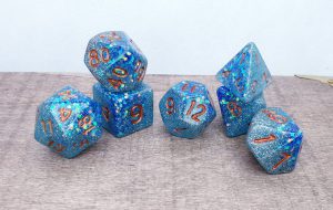 Handmade polyhedral dungeons and dragons dice set in aqua and blue with glitter
