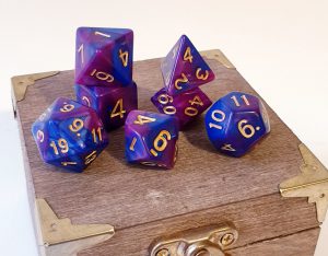Blue and pink polyhedral dungeons and dragons dice set