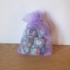 Waterlily dirty pour cool tone polyhedral dungeons and dragons dice set in lilac bag