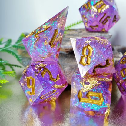 Magenta with gold foil and iridescent inclusions sharp edge handmade polyhedral dungeons and dragons dice set