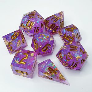 Magenta with gold foil and iridescent inclusions sharp edge handmade polyhedral dungeons and dragons dice set