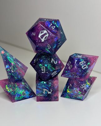 Purple blue and pink resin with glitter and iridescent inclusions sharp edge handmade polyhedral dungeons and dragons dice set